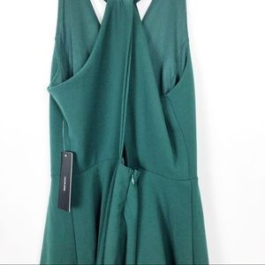 wonder whirl dark green twist back skater dress